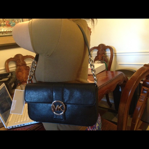 NWT black leather MK shoulder/clutch bag.