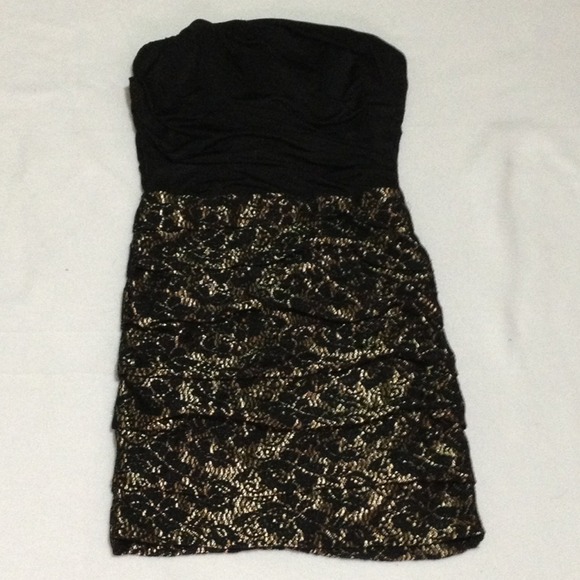 Nice dress, new, color black and gold, size m