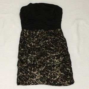 Nice dress, new, color black and gold, size m