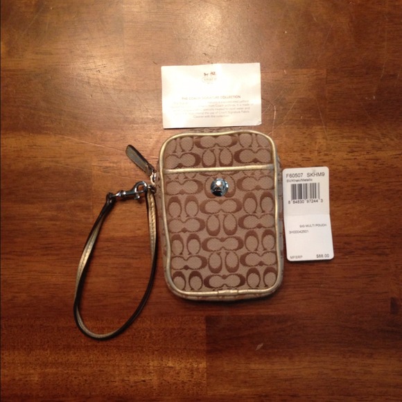 Genuine Coach wristlet.  Perfect for cellphones!