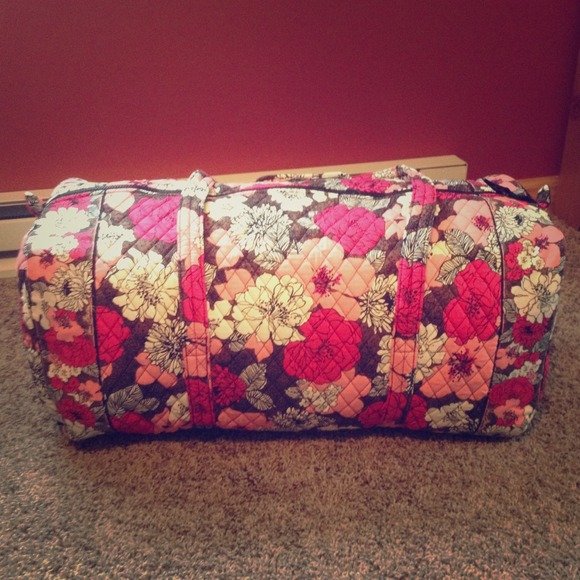 ON HOLD!! vera bradley.mocha rouge. large duffel.