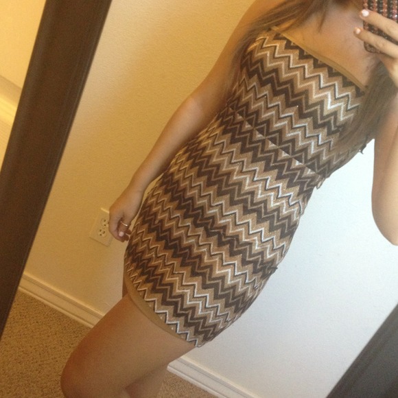 Gold black dress.
