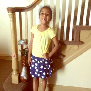 I'm selling a doted skirt with a yellow t shirt