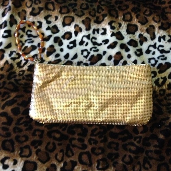Guess metallic wristlet.