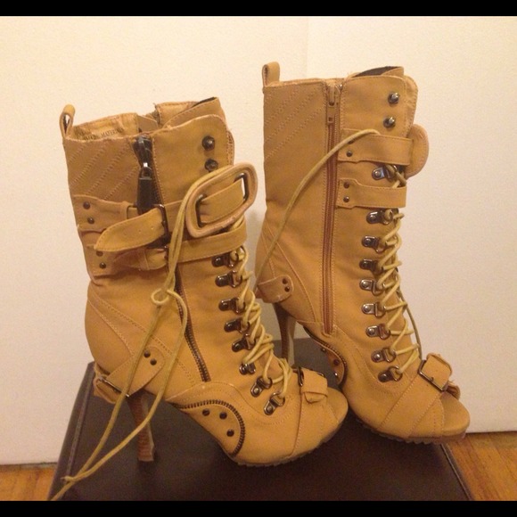Brand new peep toe lace up boots on tan size 7