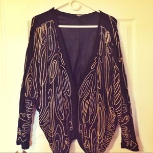 black dolman sleeve top with golden + silver beads