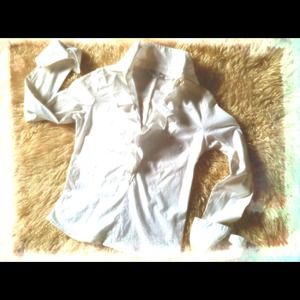 Liquid white ruffle blouse that a classic!