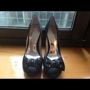Black Nina peep toe pumps