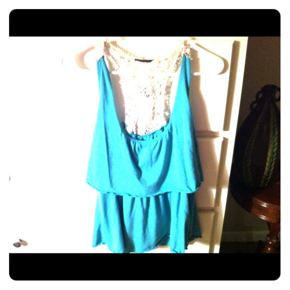 Cute turquoise layered tank.