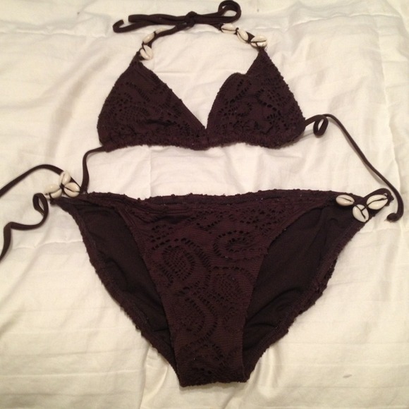 Brown bathing suit was seashells
