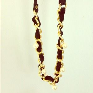 Chain statement necklace adorned with pearls