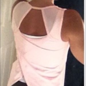 Pink Lululemon top. Open Back no bra liner.