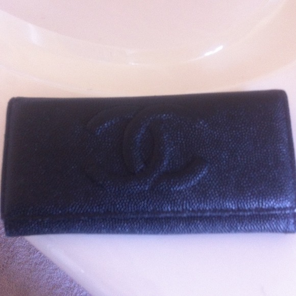 Black CC wallet. Used it only once/great condition