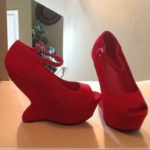 Stylish red wedge heels.