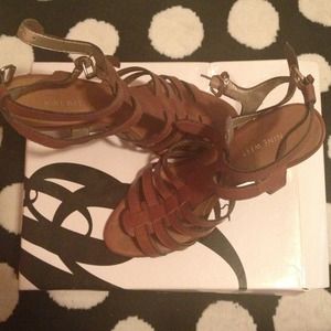 Brown leather wedge gladiator sandals.
