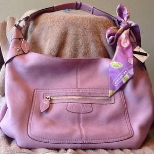 Checking authenticity of purple coach hobo bag