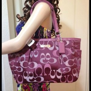 SOLD. AUTHENTIC BRANDNEW PURPLE COACH BAG.