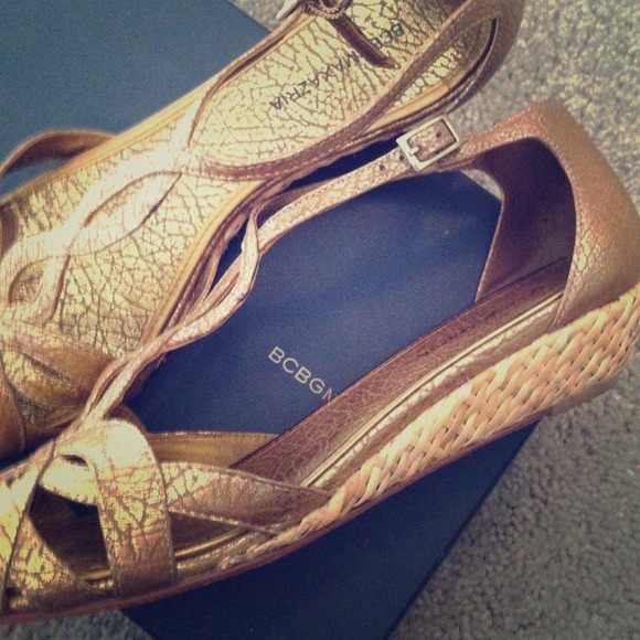 BCBGMaxAzria Shoes - Amazing gold bcbg wedges reduced from $75 trade :)