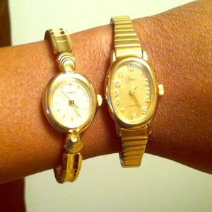Two timex like new gold watches