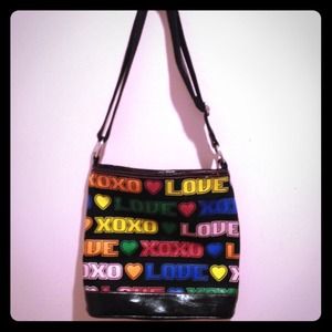 Leather LOVE XOXO Purse with adjustable strap.