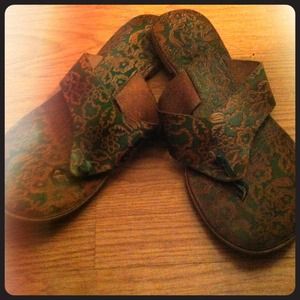 Size 6 leather flip flops.