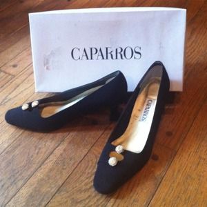 Never worn black Caparros heals