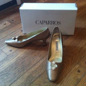 Practically new gold Caparros heals