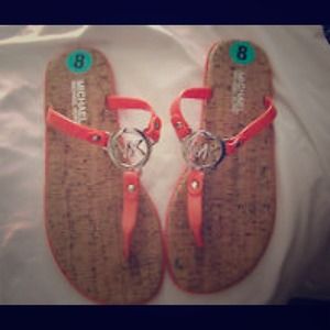 Mk flip flops in orange