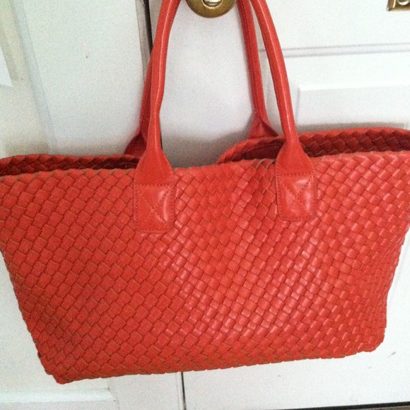 Orange tote bag with small zipper bag