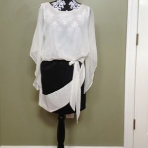 White and black chiffon slit-sleeve dress.  NWT
