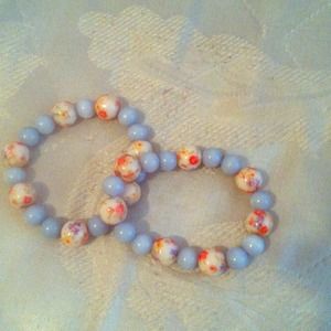 Two matching bracelettes .