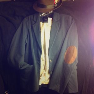 Navy blue blazer With brown fedora hat