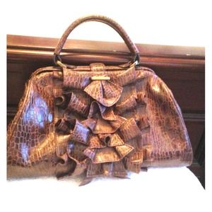 Jessica Simpson arm bag