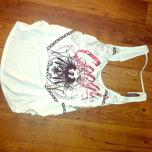 A Coogi tank that shows off stomach