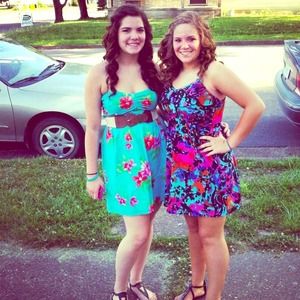 Blue floral print dress on the LEFT 🌸🌺👈