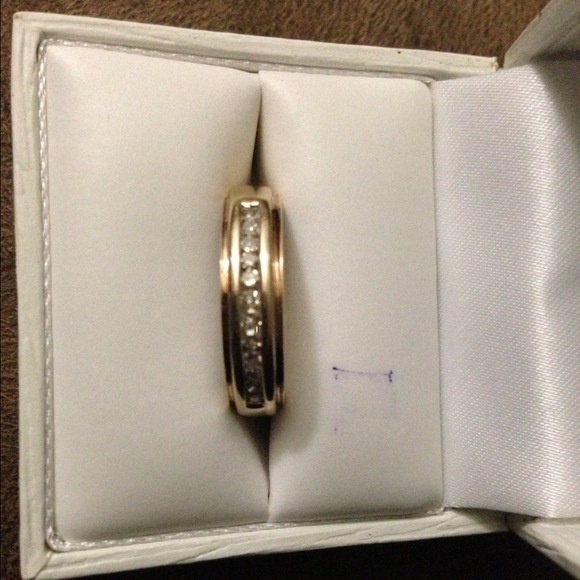 12 diamonds...size 7...10k gold