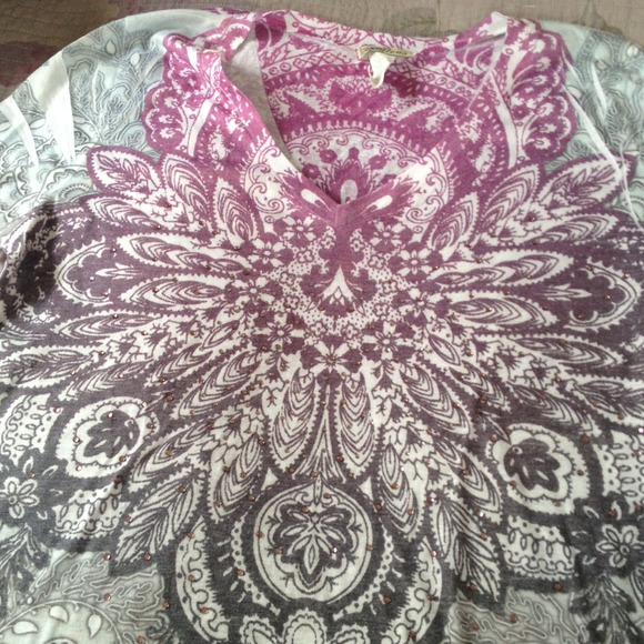 Never worn size is 2x but fits like a large