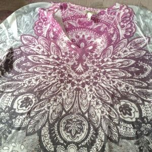 Never worn size is 2x but fits like a large