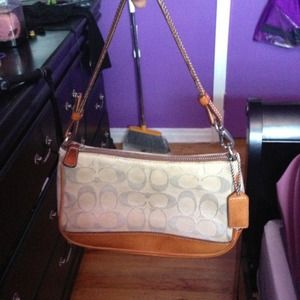 Neutral coach purse
