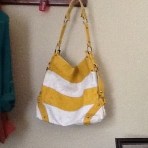 Bucket style purse yellow and white striped