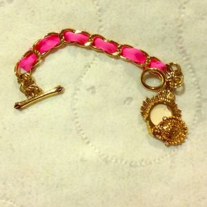 Juicy couture charm bracelet with fragrance.
