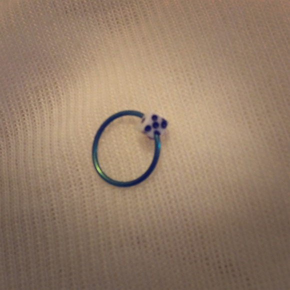 Green hoop with white dice cartilage earring