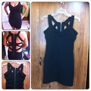 Sexy black dress, peak a boo cut outs in the back