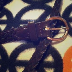 Dark brown braided belt. Gold buckle.