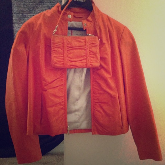 Orange leather jacket with matching purse