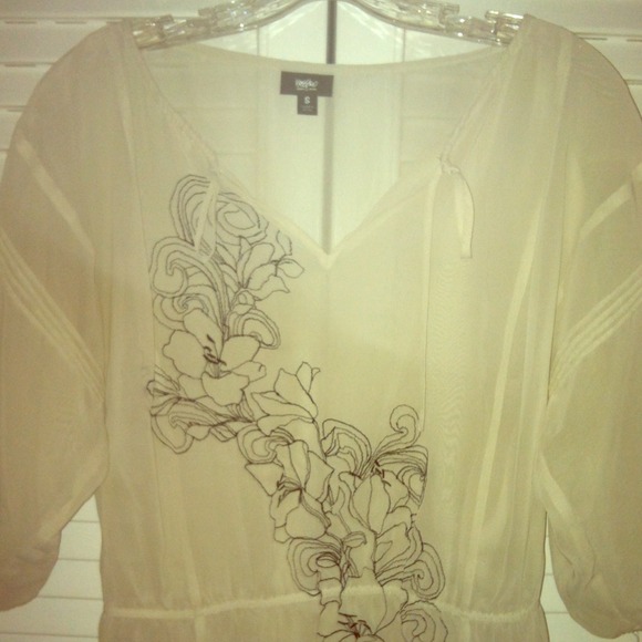 Sheer cream top with black flower stitching