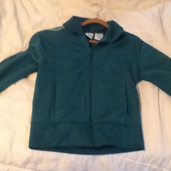 I'm selling a small, turquoise workout jacket. - Picture 2 of 3