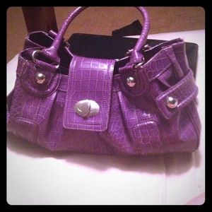 A beautiful semi new CATO's handbag.