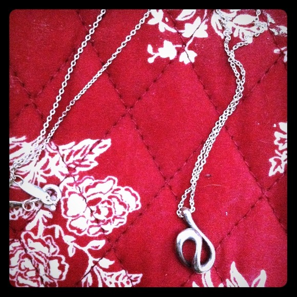 Tiffany Elsa Peretti Open Wave necklace.