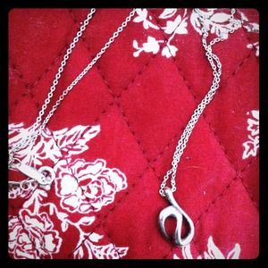 Tiffany Elsa Peretti Open Wave necklace.